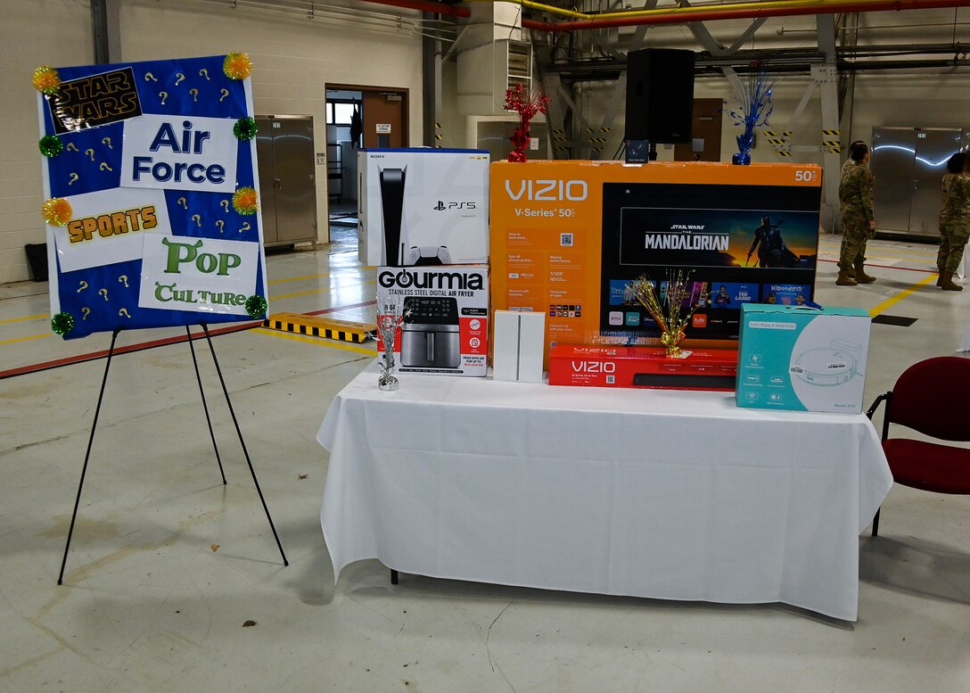 Prizes sit on display at the 316th Wing 2022 Annual Awards Ceremony at Joint Base Andrews, Md., Feb. 16, 2023. The members of the 316th Wing had an opportunity to answer questions on various topics to win prizes. (U.S. Air Force photo by Airman 1st Class Matthew-John Braman)