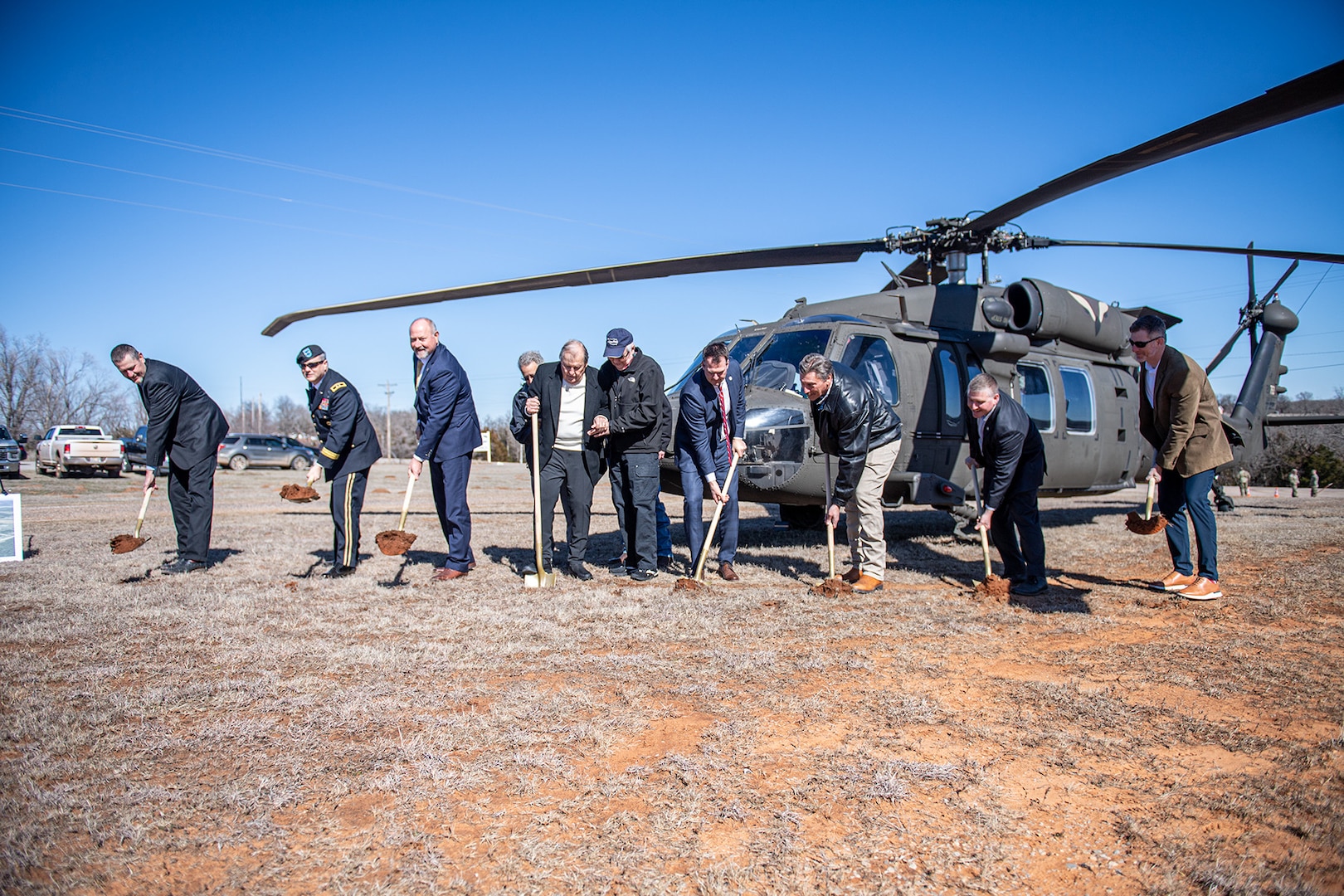 Oklahoma Governor Kevin Stitt (center), Representative Kevin Wallace (third from left), Maj. Gen. Thomas H. Mancino (second from left) and other state leaders break ground for the Oklahoma National Guard Joint Operations Center in Chandler, Oklahoma, Feb. 17, 2023. (Oklahoma National Guard photo by Anthony Jones)