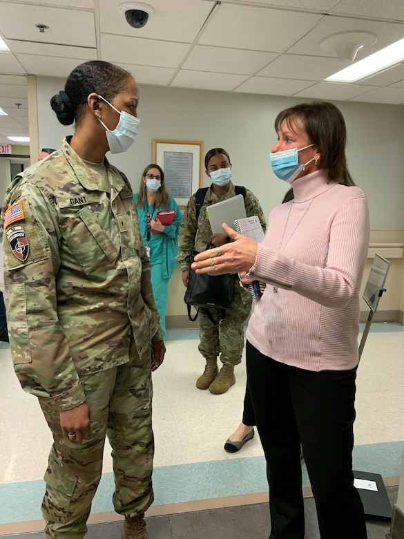 U.S. Army Corps of Engineer South Pacific Division Commander Brig. Gen. Antoinette Gant, left, discusses the positive impact of project completion with Joyce Rudders, acting deputy associate director of Patient Care Services, Phoenix VA Medical Health Care System, during a tour of the Carl T. Hayden VA Medical center Feb.2 in Midtown Phoenix. The Corps’ Los Angeles District is slated to remodel Inpatient Ward 2C at the VA medical center, resulting in more single-patient rooms and the integration of building and medical systems over an 11,000-square-feet area.