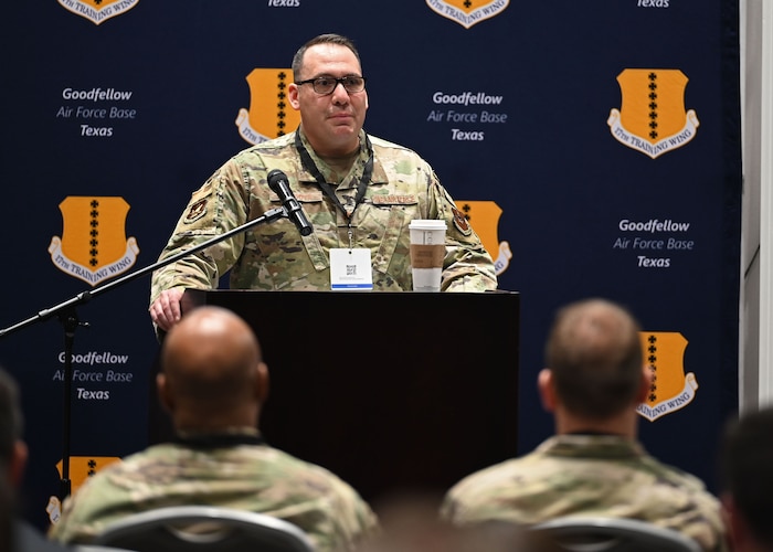 U.S. Air Force Maj. Richard Cordova, Second Air Force A9, briefs industry partners and base members during Industry Days in the Powell Event Center, Goodfellow Air Force Base, Texas, Feb. 15, 2023. Air Force leaders explained how government processes worked and presented the concept of 6th Generation Classrooms. (U.S. Air Force photo by Senior Airman Ethan Sherwood)