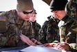 New Jersey Army National Guard Sgt. Thomas Kwiatkowski of 1st Detachment, 3rd Battalion, 112th Infantry Regiment, 44th Infantry Brigade Combat Team, collaborates with Albanian Armed Forces forward observers on fundamentals of operations, at Land Forces Headquarters, Zall-Herr, Tirana, Albania, Feb. 6, 2023.