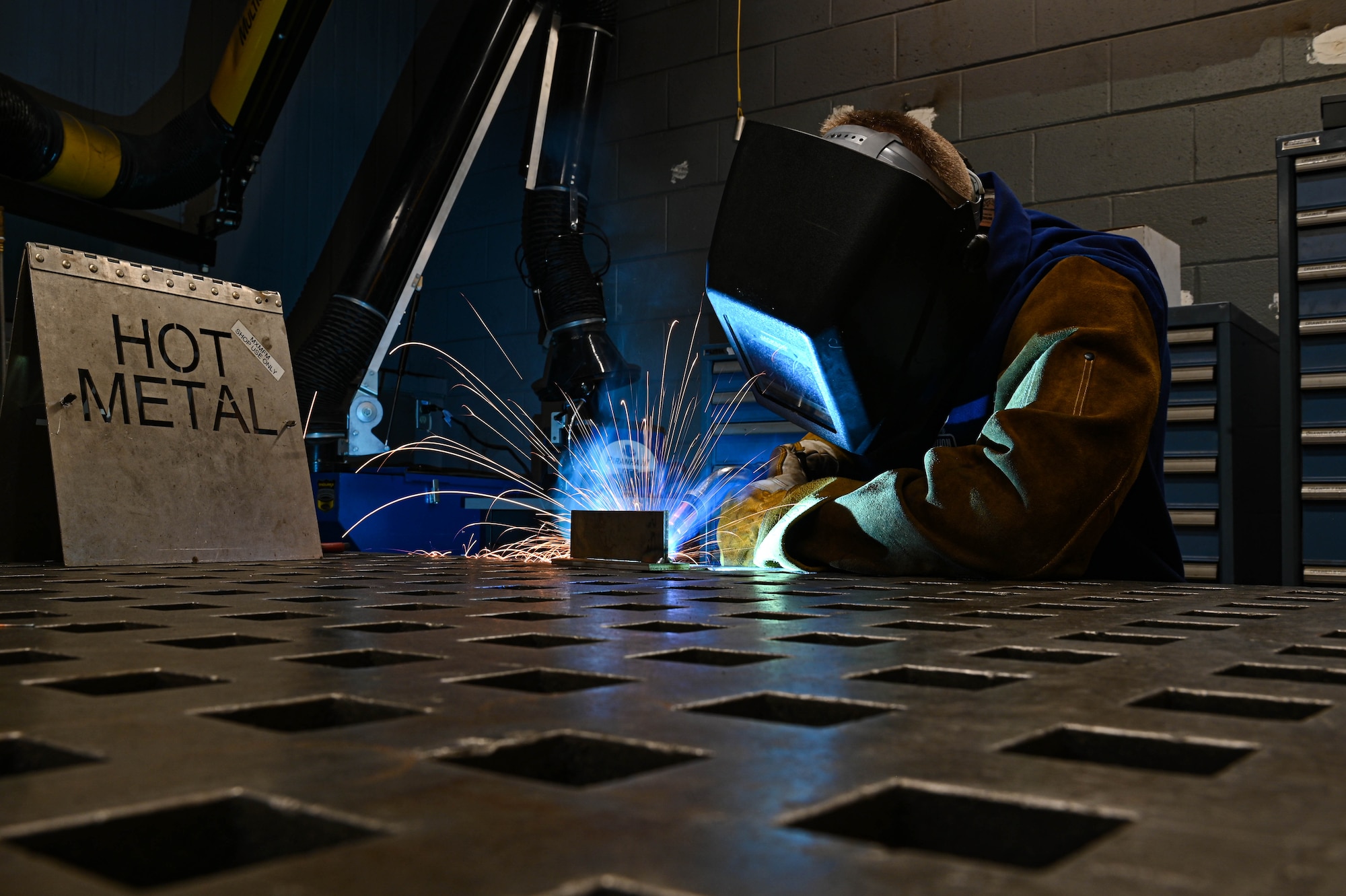 U.S. Air Force Senior Airman Cameron Balon, 23rd Maintenance Squadron aircraft metals technician, welds pieces of metal together at Moody Air Force Base, Georgia, Dec. 13, 2022. Airmen are required to be weld certified and recertify every five years with various techniques. (U.S. Air Force photo by Senior Airman Rebeckah Medeiros)