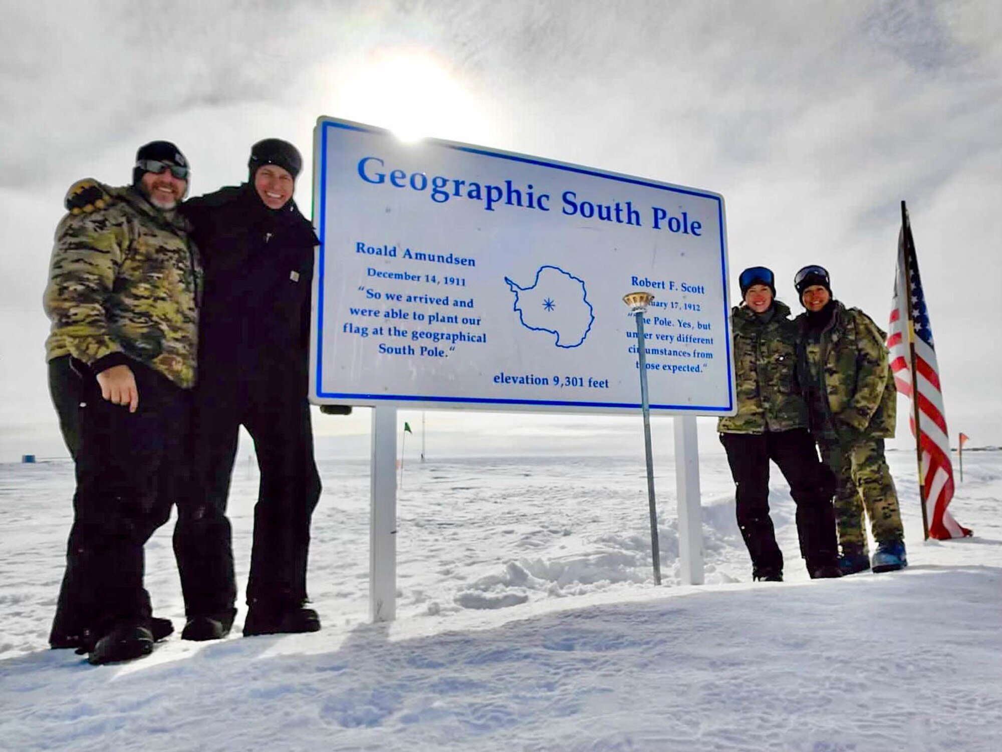 The South Pole retrograde cargo team, from left, Staff Sgt. Mark Ebensperger, Tech. Sgt. Brandon Wiggand, Tech. Sgt. Shannan O’Connor, and Staff Sgt. Jessica Cruz, at the geographic South Pole in Antarctica, Nov. 30, 2022. The team deployed to Antarctica for five weeks to help remove excess cargo from the South Pole.