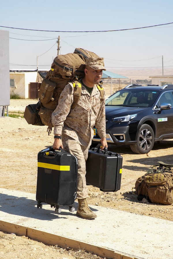 A U.S. Marine with 3rd Air Naval Gunfire Liaison Company, U.S. Marine Corps Forces Reserve, arrive at the logistics support area during exercise Intrepid Maven 23.2, Feb. 19, 2023. Intrepid Maven is a bilateral exercise between USMARCENT and the IDF designed to improve interoperability, strengthen partner-nation relationships in the U.S. Central Command area of operations and improve both individual and bilateral unit readiness. (U.S. Marine Corps photo by Staff Sgt. Victor Mancilla)