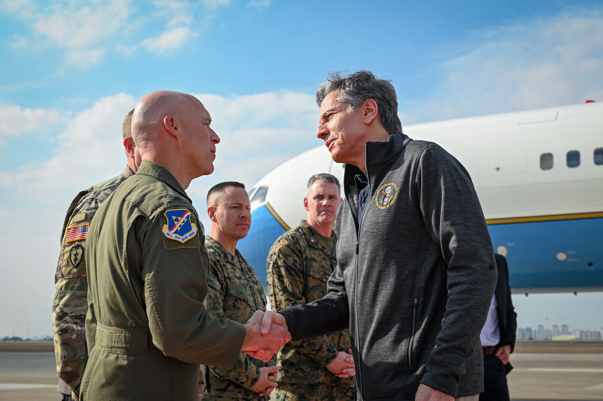 U.S. Air Force Col. Calvin Powell, 39th Air Base Wing commander, greets U.S. Secretary of State Antony J. Blinken at Incirlik Air base, Türkiye, Feb. 19, 2023.