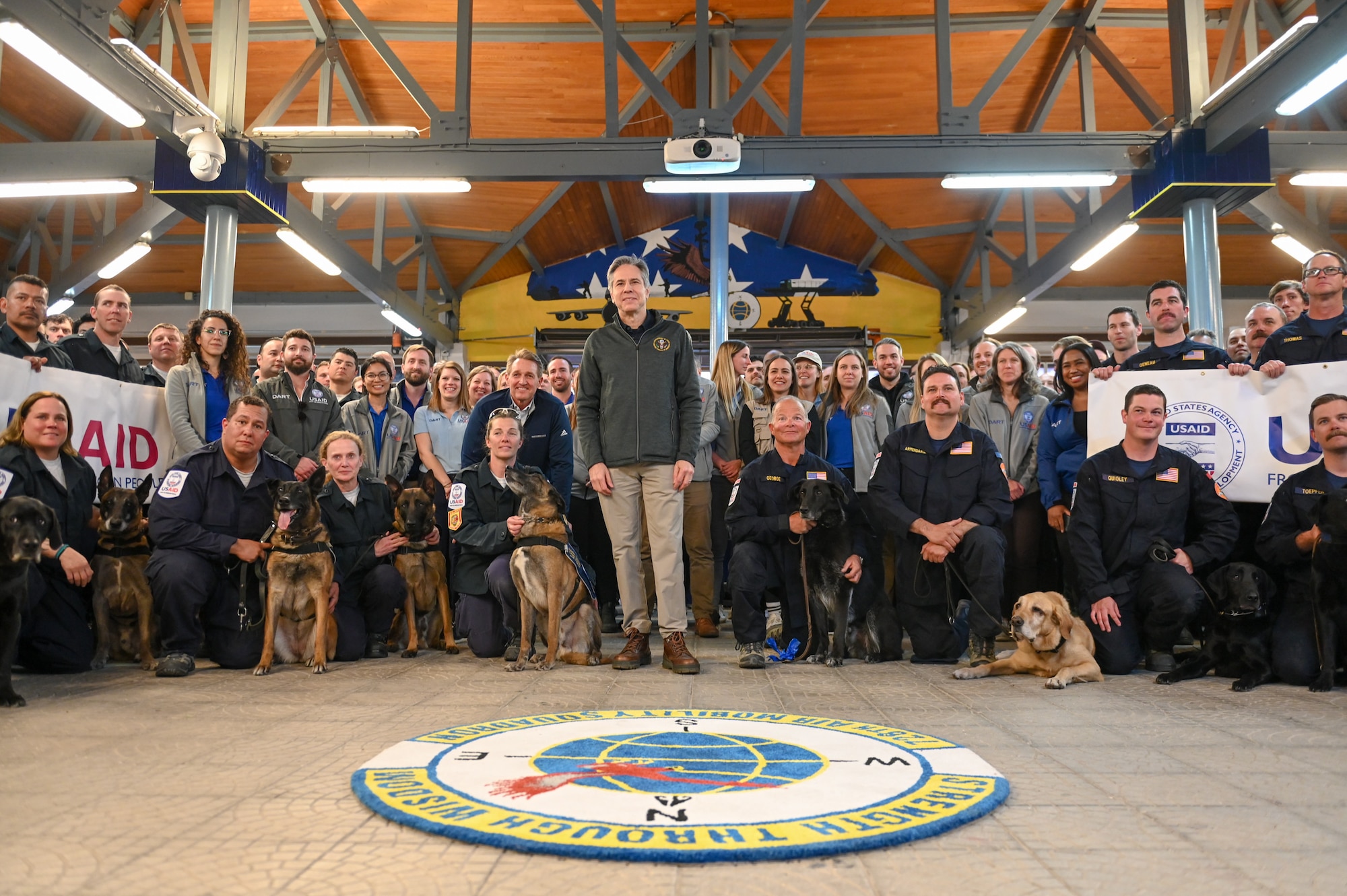 U.S. Secretary of State Antony J. Blinken poses for a picture with USAID DART members at Incirlik Air base, Türkiye, Feb. 19, 2023.