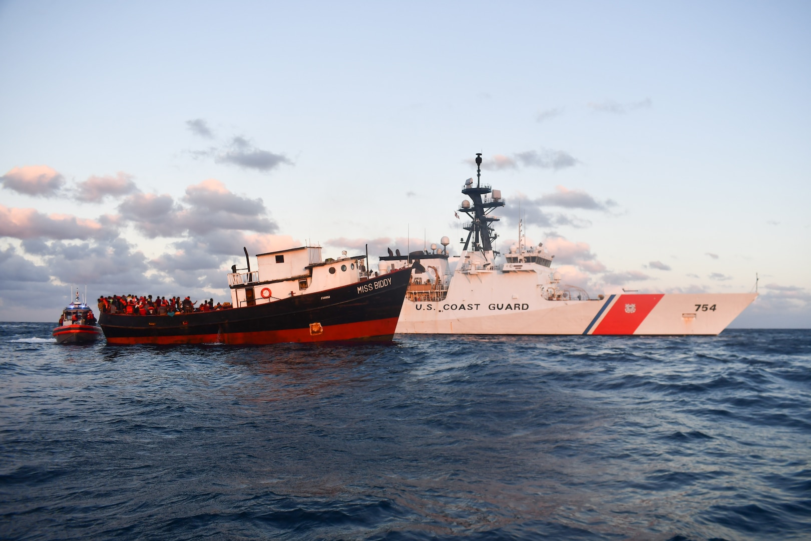 Coast Guard Cutter Isaac Mayo stopped the illegal voyage of an overloaded 80-foot motor vessel, 30 miles northeast of Caibarien, Cuba, Feb.15, 2023. There were over 300 people aboard the Haitian-suspected, migrant voyage vessel. (U.S. Coast Guard photo by Lt. Alexander Cordes)
