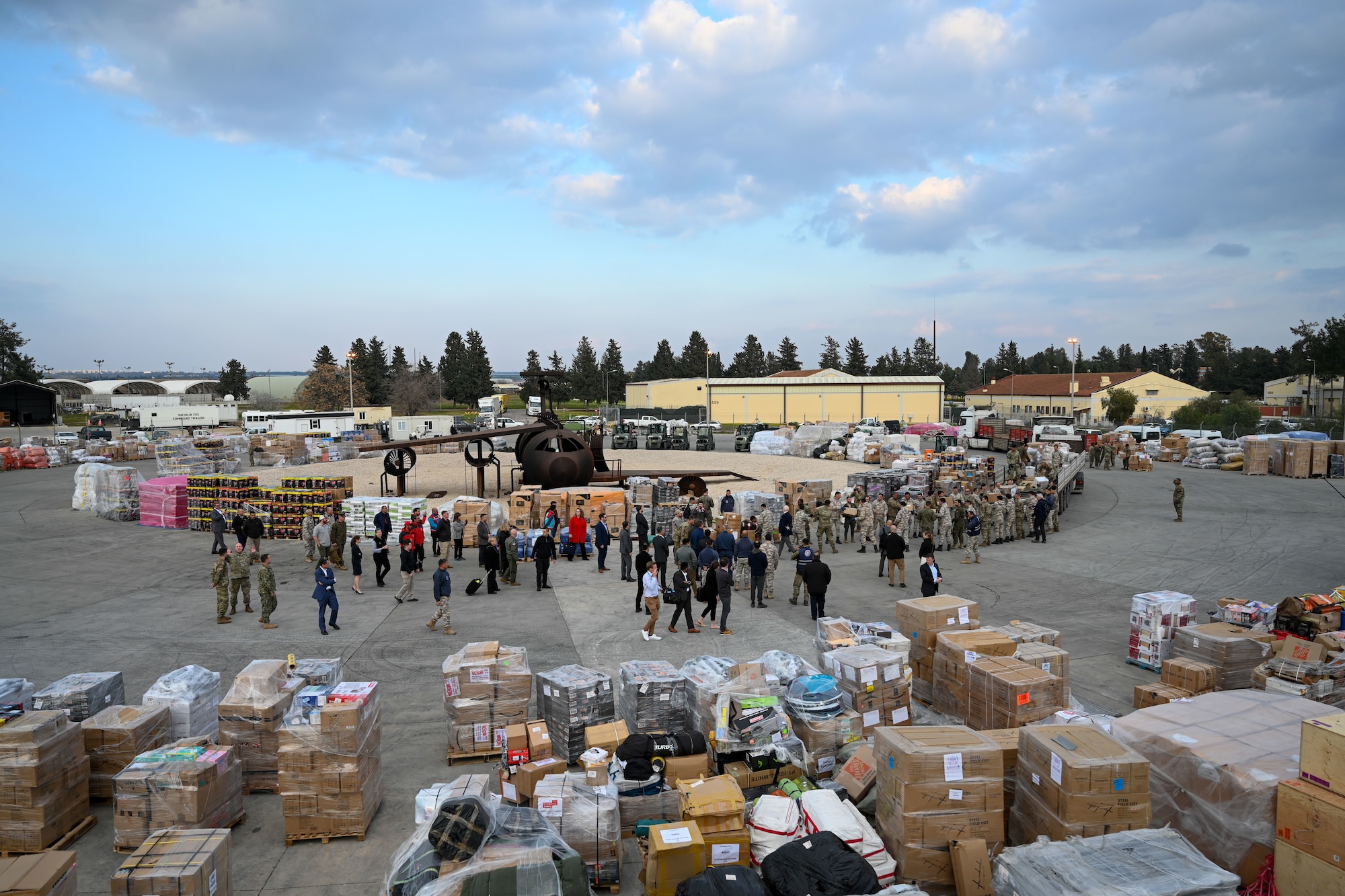 U.S. Secretary of State Antony J. Bliken observes U.S., Spanish and Turkish military members load a truck with humanitarian aid at Incirlik Air Base, Türkiye, Feb. 19, 2023.