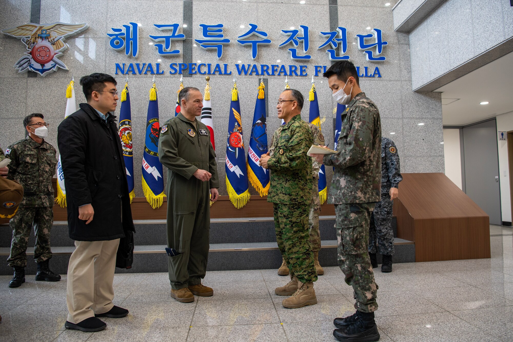U.S. Air Force Lt. Gen. Scott Pleus, 7th Air Force commander (left), speaks with Republic of Korea Navy Rear Adm. Hoo-byung Park, Naval Special Warfare Flotilla commander, during a visit, Feb. 15, 2023, in Jinhae, Republic of Korea.