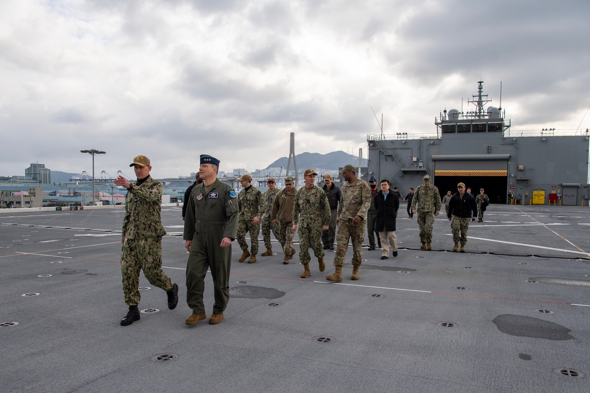 U.S. Navy Capt. Patrick Keller (left), USS Miguel Keith commanding officer, talks to U.S. Air Force Lt. Gen. Scott Pleus (right), 7th Air Force commander, during a tour of the USS Miguel Keith (ESB-5), Feb. 15, 2023, in Busan, Republic of Korea.