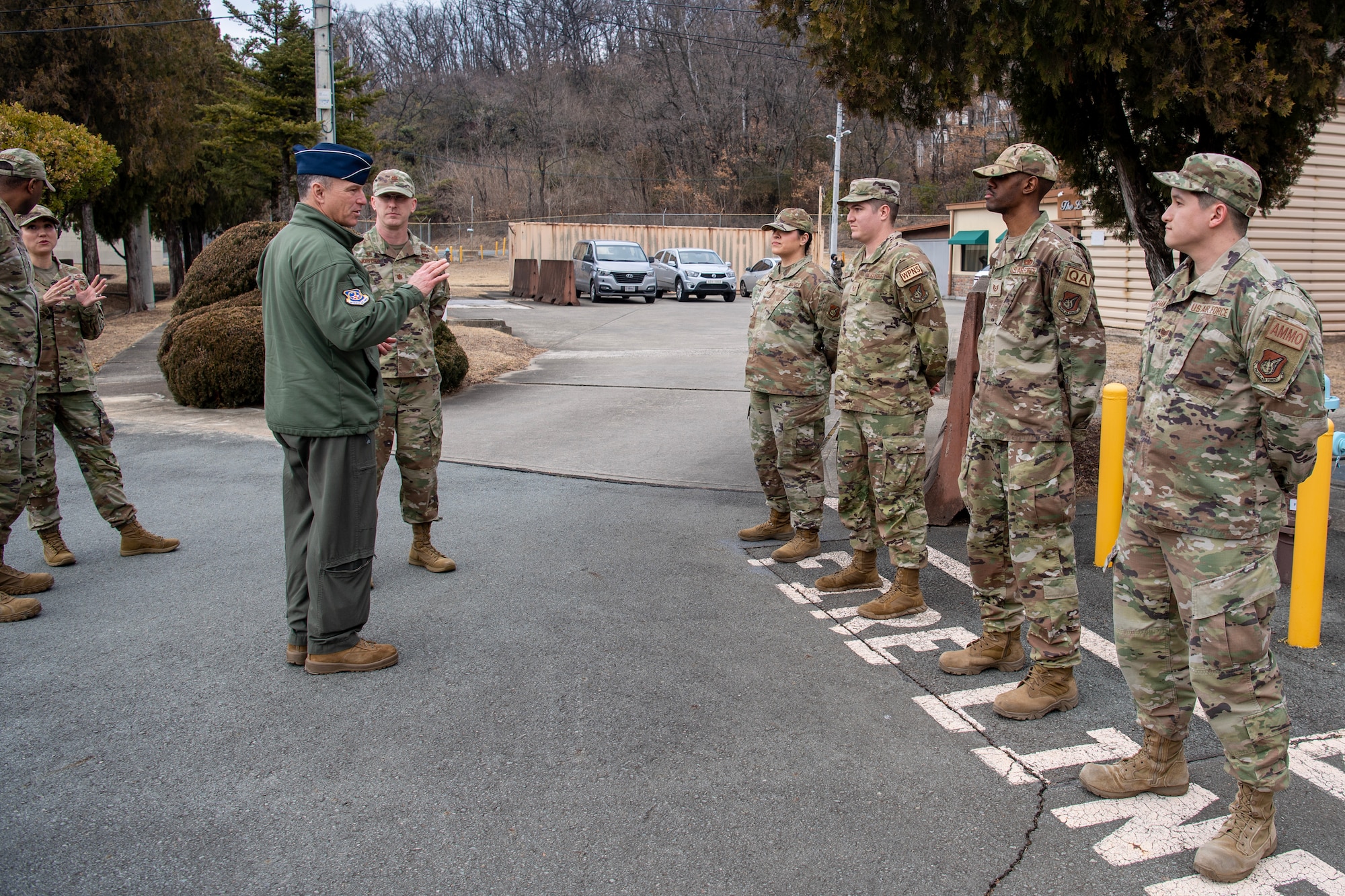 U.S. Air Force Lt. Gen. Scott Pleus, 7th Air Force commander, speaks with Airmen recognized as outstanding performers from the 607th Materiel Maintenance Squadron (MMS) in Daegu, Republic of Korea, Feb. 16, 2023.
