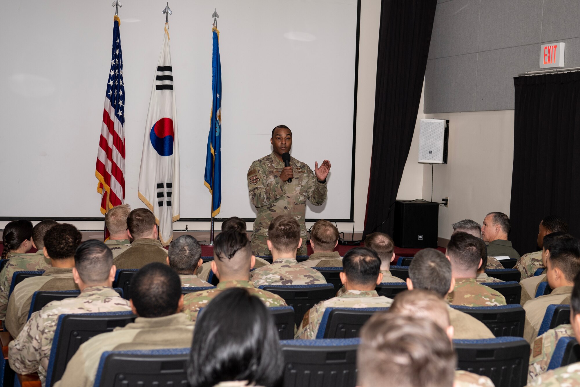 U.S. Air Force Chief Master Sgt. Alvin Dyer, 7th Air Force command chief, speaks to Airmen from the 607th Materiel Maintenance Squadron (MMS) during an all-call in Daegu, Republic of Korea, Feb. 16, 2023