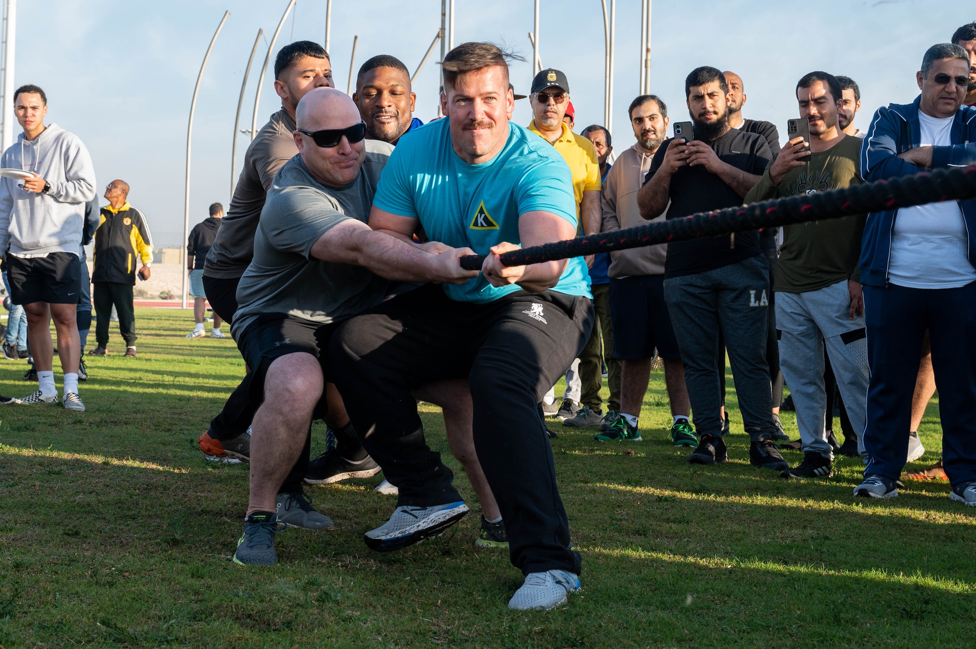 In this photo, U.S. Airmen play Tug-Of-War.