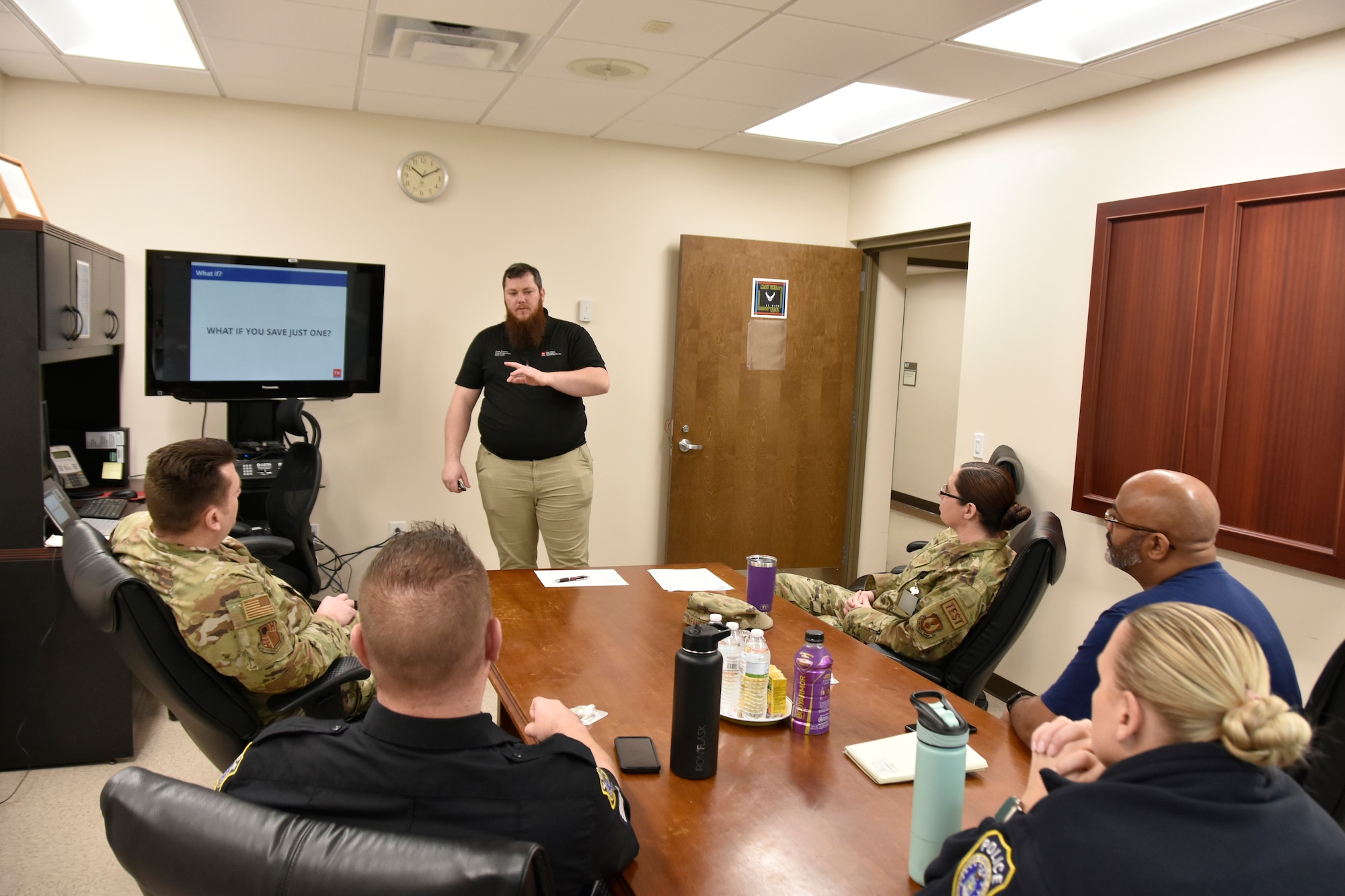 Personnel from several Arnold Air Force Base organizations attend an opioid response training course led by Joshua Crews with the Tennessee First Responder Engagement Specialty Team, standing, Feb. 8, 2023, in the Arnold AFB Medical Aid Station at Arnold AFB, Tennessee. The class was the first of five classes that will be presented for Arnold AFB medical and security forces personnel and other selected individuals and was hosted by the Arnold Engineering Development Complex Commander’s Drug Demand Reduction Program Team. (U.S. Air Force photo by Bradley Hicks) (This image has been altered by obscuring badges for security purposes)