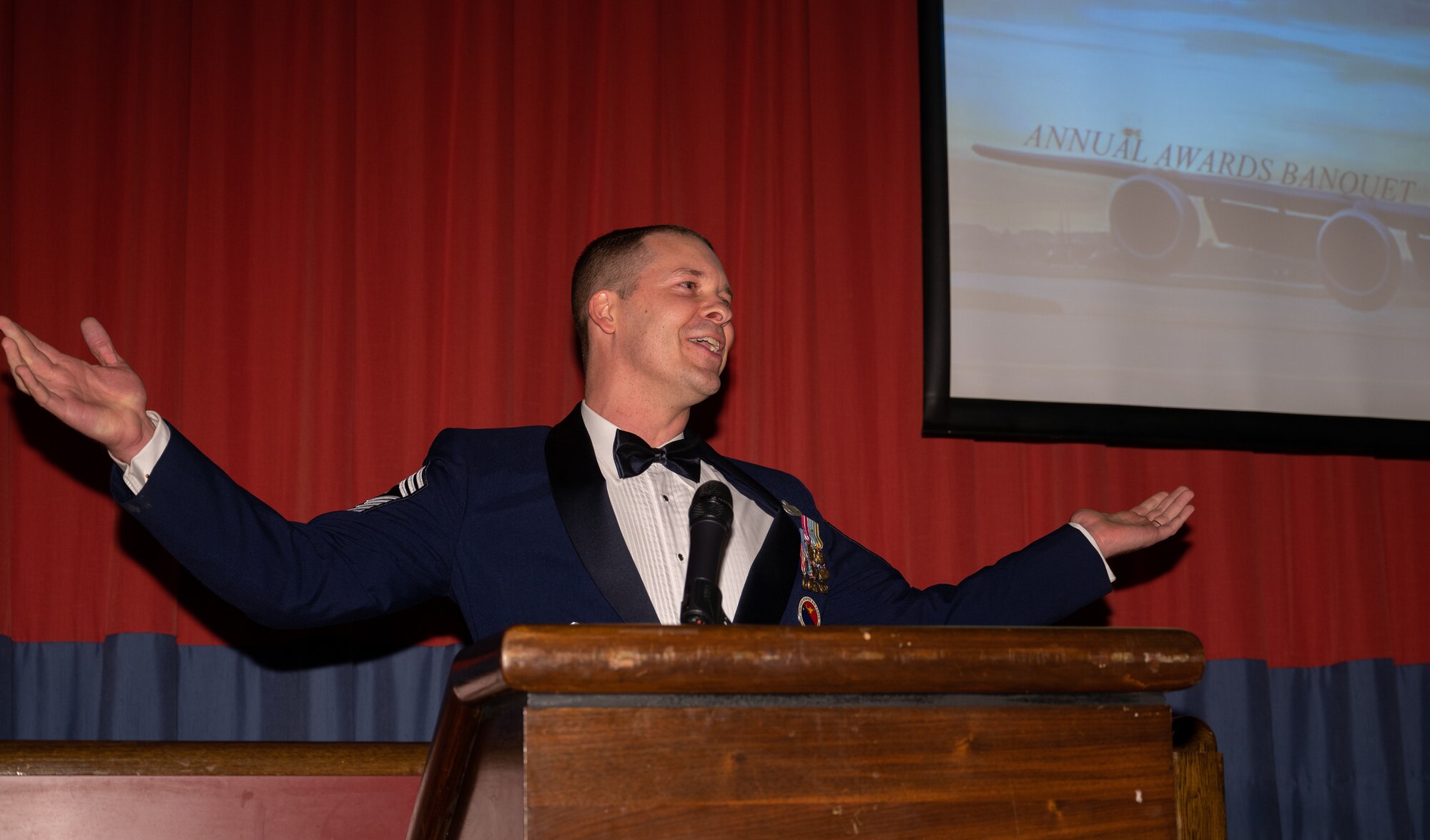 U.S. Air Force Chief Master Sgt. Michael Venning, 100th Air Refueling Wing command chief, speaks to the attendees of the 100th ARW annual awards ceremony, Feb. 15, 2023, at Royal Air Force Mildenhall, England.