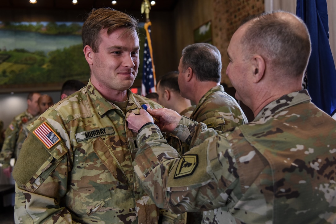 Virginia National Guard Soldiers assigned to Sandston-based 2nd Battalion, 224th Aviation Regiment, 29th Infantry Division receive the Air Medal during a ceremony held Feb. 5, 2023, in Williamsburg, Virginia. The Air Medal was awarded to the Soldiers for their life-saving actions taken while deployed as part of Task Force Pegasus and served as the aviation task force for NATO-led Kosovo Force Regional Command-East in 2022. (U.S. Army National Guard photo by Sgt. 1st Class Terra C. Gatti)