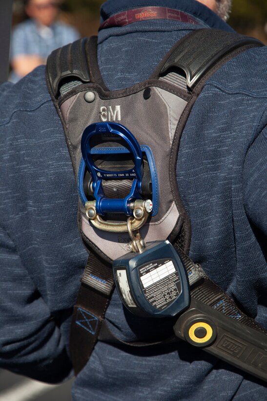 A 3M Company representative wears a fall protection harness while demonstrating the devastating impact of falling from short distances during a U.S. Army Corps of Engineers Fall Protection Competent Person 24-Hour Course.