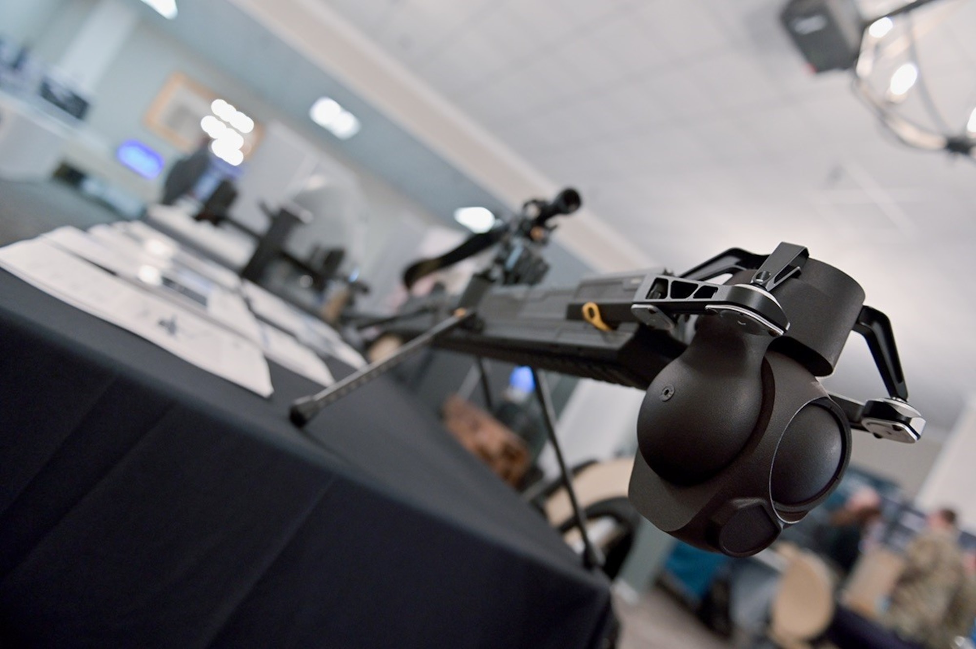 An Anduril Ghost small unmanned aerial system sits on an Innovation Day display booth at Shaw Air Force Base, S.C., Feb 15, 2023. This was the first Innovation Day hosted by 9 AF (AFCENT).  More than 70 industry partners and 230 participants attended the event designed to connect the organization with solutions to problem sets in their 21-country area of responsibility.