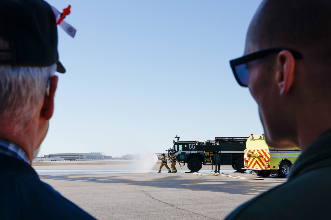 U.S. Marines with Aircraft, Rescue and Firefighting put out a simulated fire to demonstrate their response time, Marine Corps Air Station (MCAS) Cherry Point, North Carolina, Feb. 13, 2023. The tour allowed American Legion Post 539 members an inside look at some installation operations and resources and the daily responsibilities of service members and civilians at Cherry Point. (U.S. Marine Corps photo by Lance Cpl. Lauralle Walker)