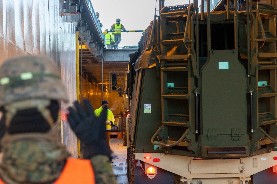 A U.S. Marine with Combat Logistics Battalion 2, Combat Logistics Regiment 2, 2nd Marine Logistics Group, operates a Medium Tactical Vehicle Replacement during Marine Rotational Force- Europe 23.1 in Gottersjorda, Norway, Jan. 30, 2023. MRF-E 23.1 focuses on regional engagements throughout Europe by conducting various exercises, mountain-warfare training, and military-to-military engagements, which enhances the overall interoperability of the U.S. Marine Corps with allies and partners. (U.S. Marine Corps photo by Sgt. Christian M. Garcia)