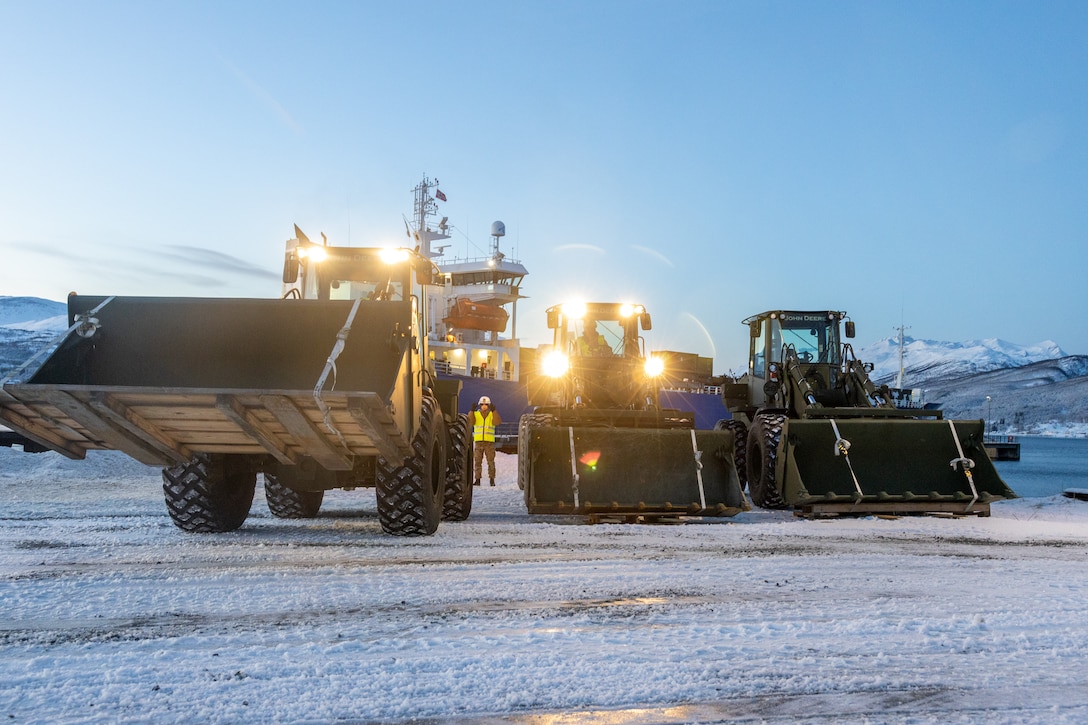 U.S. Marines with Engineer Support Company, 2nd Combat Engineer Battalion, 2nd Marine Division, park Tractor, Rubber-tired, Articulated steering, Multi-purpose vehicle during Marine Rotational Force- Europe 23.1 in Gottersjorda, Norway, Jan. 30, 2023. MRF-E 23.1 focuses on regional engagements throughout Europe by conducting various exercises, mountain-warfare training, and military-to-military engagements, which enhances the overall interoperability of the U.S. Marine Corps with allies and partners. (U.S. Marine Corps photo by Sgt. Christian M. Garcia)