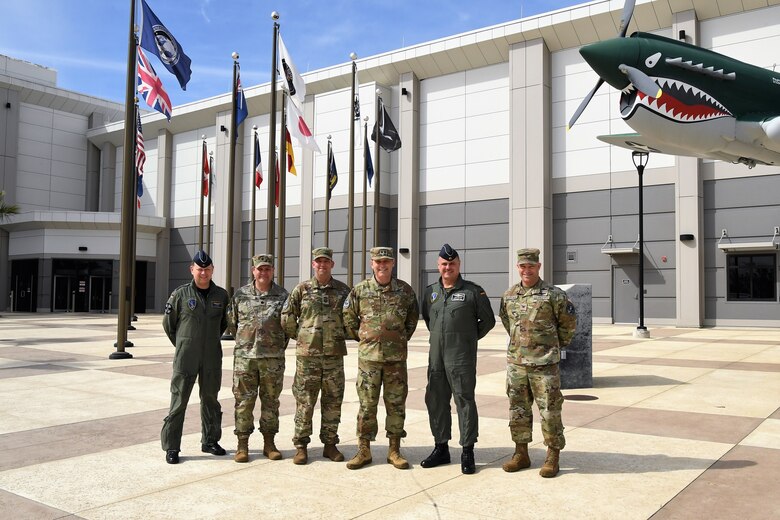 Visitors from the North Atlantic Treaty Organization (NATO) Headquarters, including German Air Force Brig. Gen. Christoph Pliet, NATO Air Command Deputy Chief of Staff, stand with Combined Force Space Component Command leadership during a visit to CFSCC Headquarters, Feb. 16, 2023. During the visit, the NATO officers had an opportunity to learn more about the CFSCC and Combined Space Operation Center missions, and gain an increased understanding of how the U.S. works with partner nations to maintain Space Domain Awareness. (U.S. Space Force photo by Capt. Erin Leon)