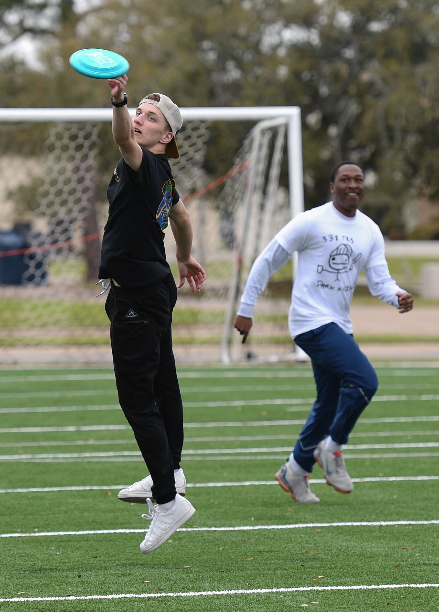 Keesler personnel attend the ultimate frisbee tournament following the turf field ribbon cutting ceremony at Keesler Air Force Base, Mississippi.