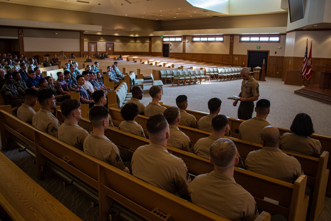 U.S. Marine Corps Sgt. Maj. Sael Garcia, sergeant major of Marine Aircraft Group 24, Marine Corps Base Hawaii, attends as the guest speaker for Headquarters Battalion's Corporals Course 1-23 graduation ceremony, Marine Corps Base Hawaii, Feb. 10, 2023. Corporals Course aims to provide Marine noncommissioned officers with the skills and knowledge necessary to become successful small-unit leaders. (U.S. Marine Corps photo by Cpl. Israel Ballaro)