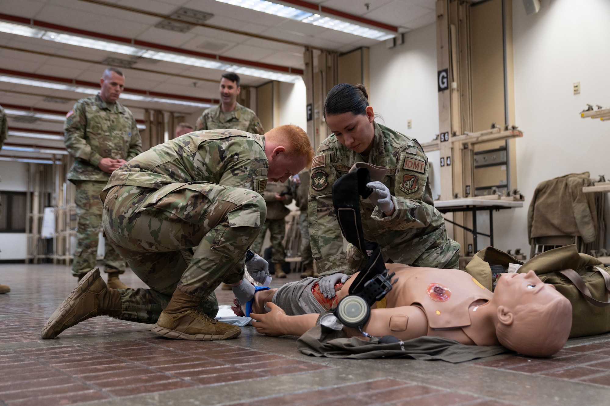 U.S. Air Force members assigned to the 51st Medical Group showcase their Tactical Combat Casualty Care training during Command Sgt. Maj. Jack Love’s, U.S. Forces Korea Senior Enlisted Advisor, visit at Osan Air Base, Republic of Korea, Feb. 16, 2023.
