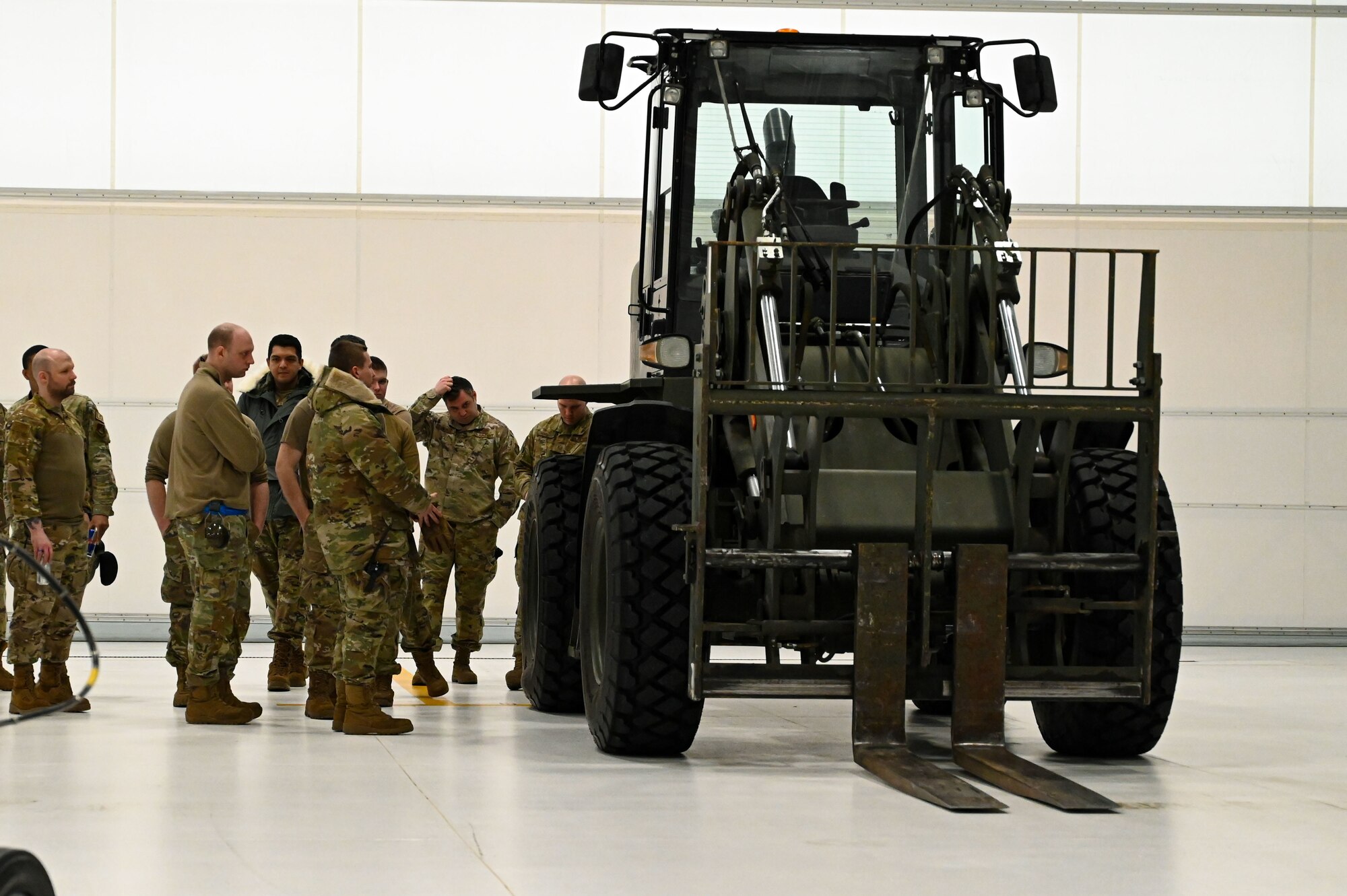 Airmen gather for a safety briefing