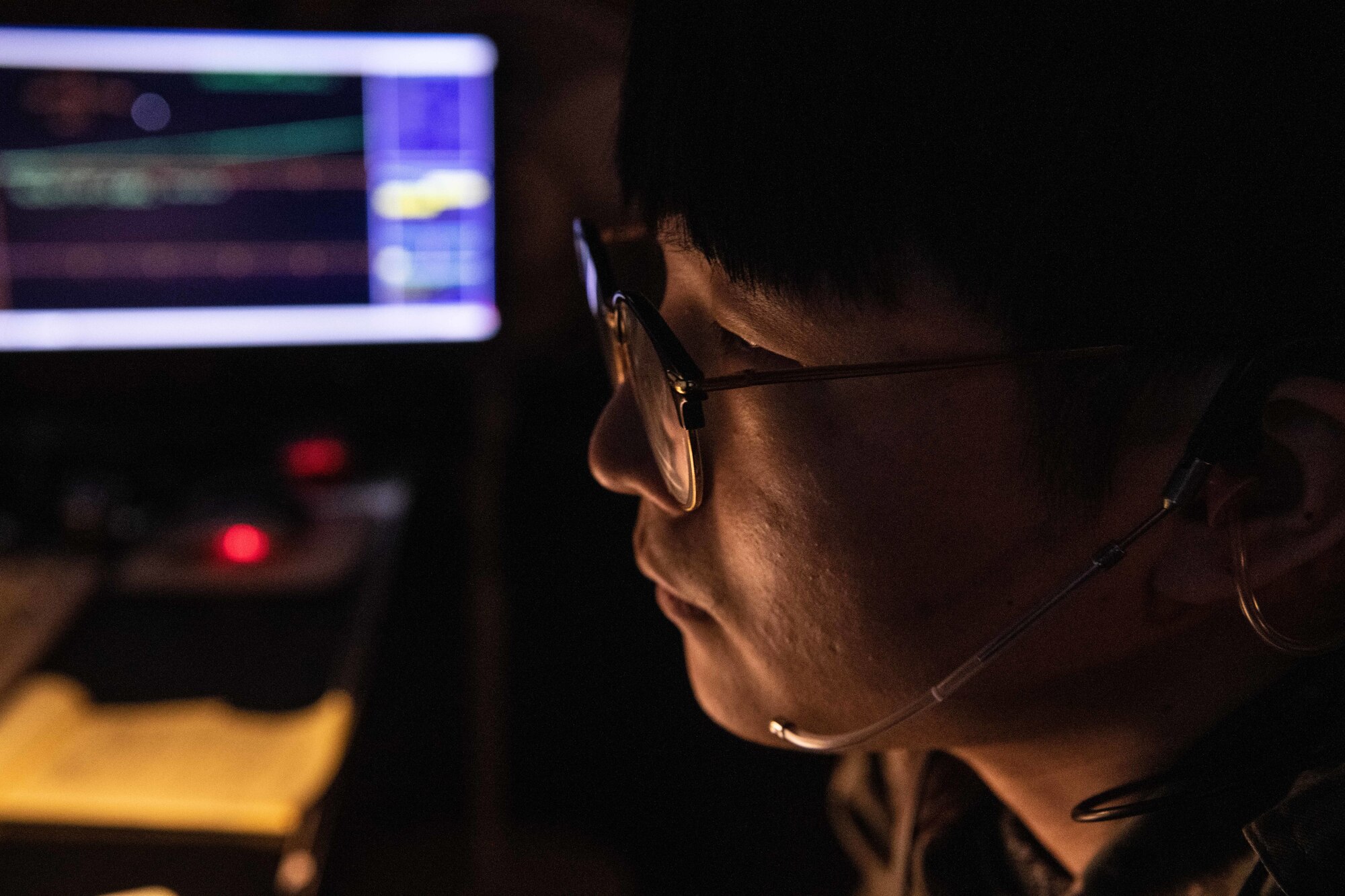 Republic of Korea Air Force Master Sgt. Seong Jin Kim, 38th Fighter Group operating branch radar controller, looks at a radar at Kunsan Air Base, Republic of Korea, Feb. 16, 2023. Kim said he observed how U.S. air traffic control radar approach control flight members handled different, complex scenarios and planned on taking those skills with him to his next base. (U.S. Air Force photo by Staff Sgt. Sadie Colbert)