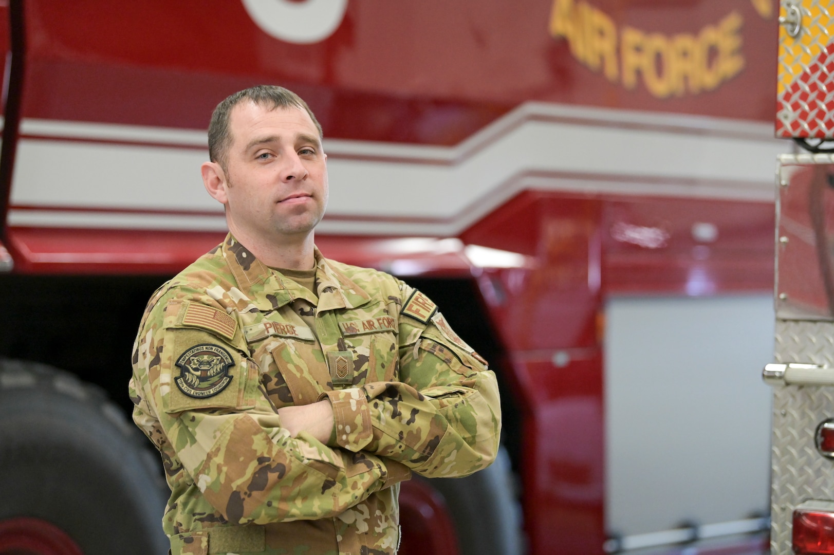 U.S. Air Force Master Sgt. Colin Pierce, the assistant fire chief of training at the 115th Fire and Emergency Services flight, Truax Field, Madison, Wisconsin poses for a photo inside the Truax Field Fire Department Feb. 2, 2023. Pierce was recently named the 2022 Air National Guard Military Fire Officer of the Year.(U.S. Air National Guard photo by Staff Sgt. Cameron Lewis)