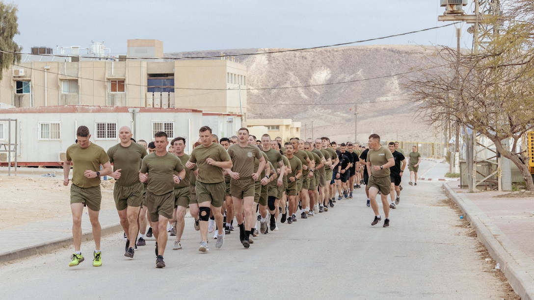U.S. Marines with 2nd Assault Amphibian Battalion, 2nd Marine Division, and soldiers with the Israeli Defense Force participate in an integrated physical training event during Intrepid Maven 23.2, in Israel, Feb. 21, 2023. Intrepid Maven is a bilateral exercise between USMARCENT and the IDF designed to improve interoperability, strengthen partner-nation relationships in the U.S. Central Command area of operations and improve both individual and bilateral unit readiness. (U.S. Marine Corps photo by Lance Cpl. Emma Gray)