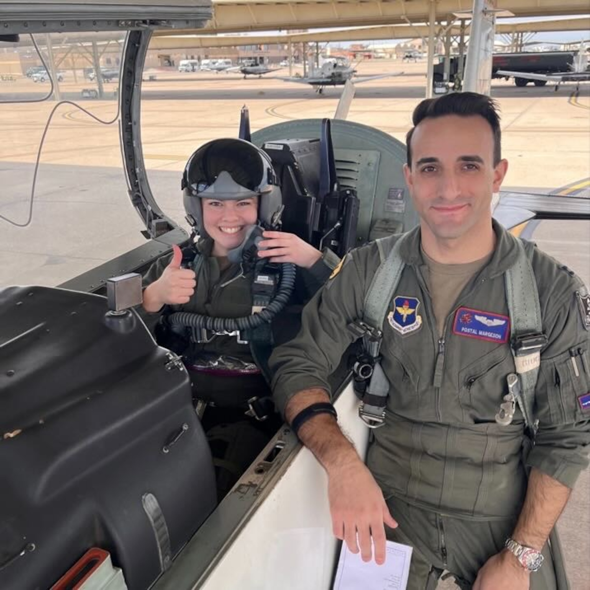 U.S. Air Force Capt. Jack Margeson, 434th Flying Training Squadron T-6A instructor pilot, and a
Texas A&M College Air Force Reserve Officer Training Corps (AFROTC) member pose in a T-6
Texan II aircraft at Laughlin Air Force Base, Texas, on Jan. 12, 2023.