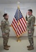 Capt. Rose McCann, team chief, 1st Regiment, 338th Training Support Battalion, administers the Oath of Reenlistment to Sgt. Zachary Shearer on Feb. 4, 2023, Fort McCoy, Wis. (U.S. Army photo by Cheryl Phillips)