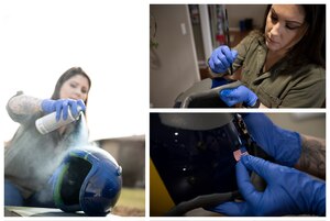 Master Sgt. Brittany Metcalfe, Air Force Life Cycle Management Center requirements manager, spray paints a recycled helmet Jan. 15 at the Wright-Patt Club at Wright-Patterson Air Force Base, Ohio.