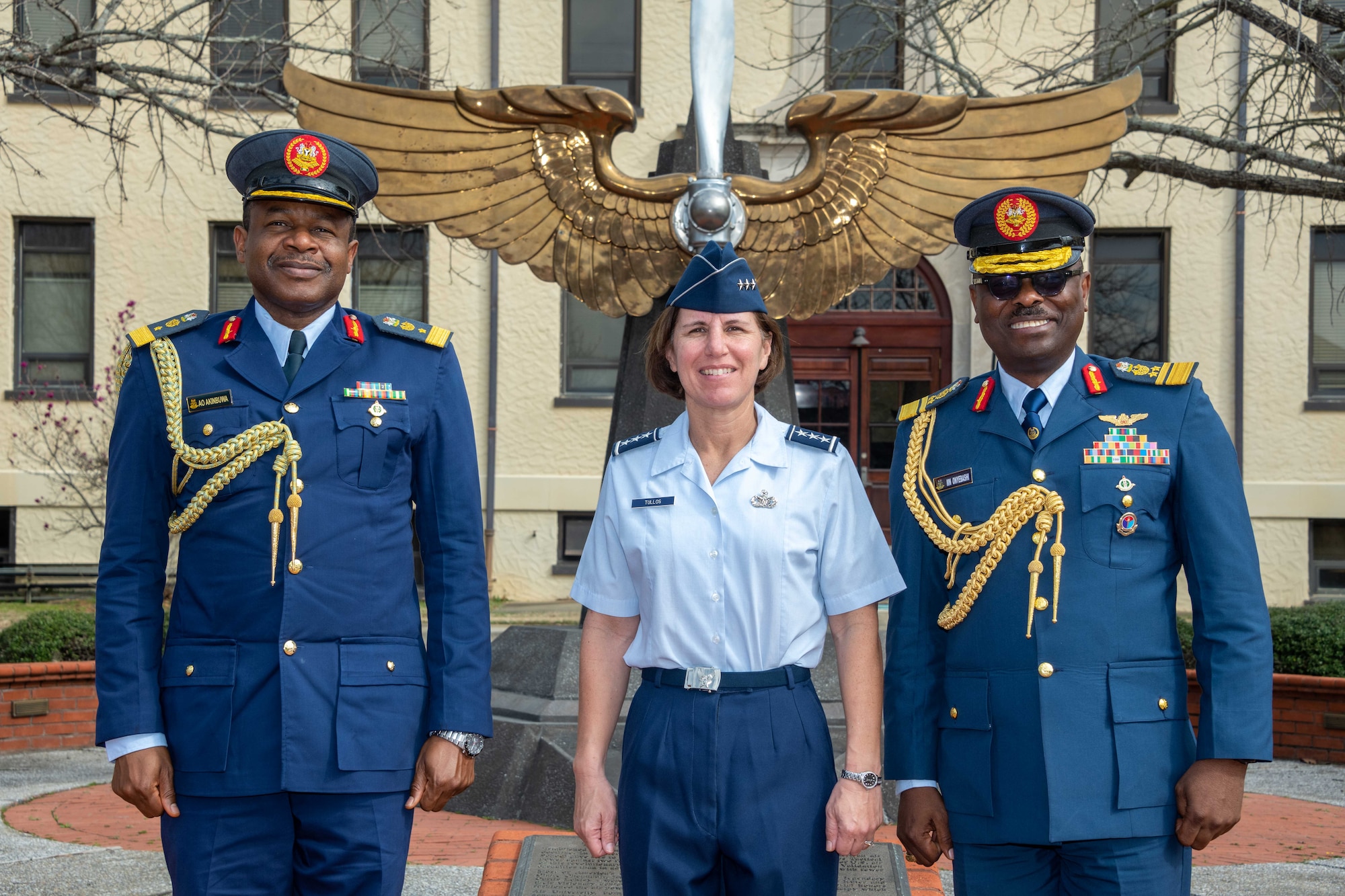 Air University Commander and President Lt. Gen. Andrea Tullos welcomes Nigerian Air Force Air Commodore Ayodele Oludamilola Akinbuwa (left) and Air Vice Marshal Micheal Nnanye Onyebashi (right) to Maxwell Air Force Base, Montgomery, Ala., Feb. 8, 2023. Onyebashi and Akinbuwa came to AU as part of the Nigerian Air Force Air Warfare Centre reciprocal visit.