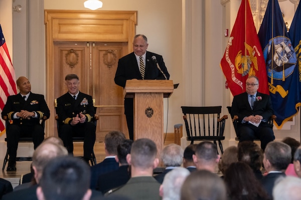 Secretary of the Navy Carlos Del Toro announces that an academic building at the U.S. Naval Academy will be renamed “Carter Hall” for former President Jimmy Carter during a ceremony in Mahan Hall.