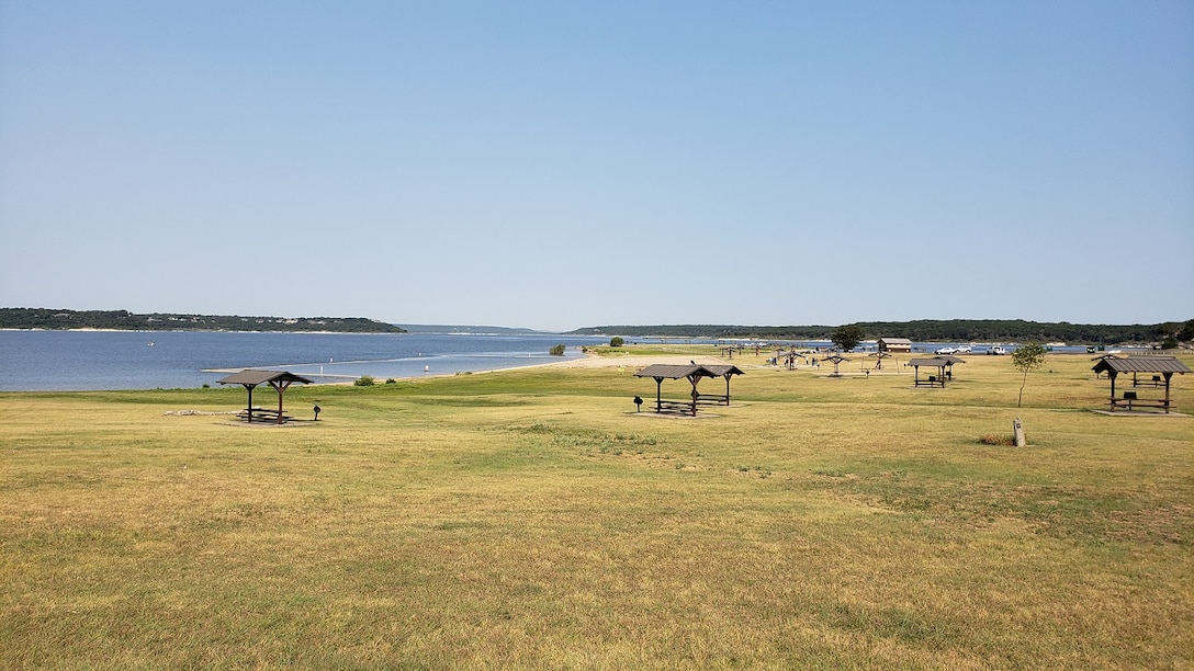 Temple Lake Park with picnic tables, swim area and lake views.