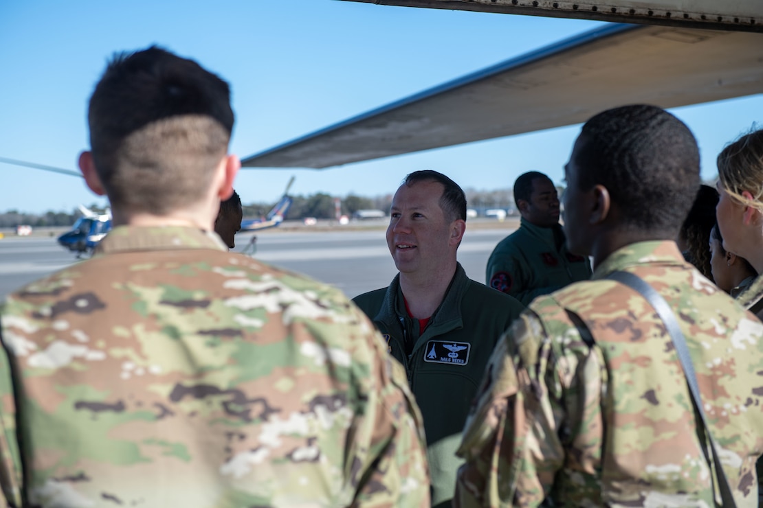 Major Dustin Weeks, 9th Bomb Squadron instructor pilot, speaks to Air Force cadets during the third day of Accelerating the Legacy 2023 at Joint Base Charleston, South Carolina, Feb. 18, 2023.