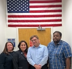 From left to right: Ashley Hove, JPRA Lessons Learned, Barb Connors, JPRA Branch Chief, William Newell, DPAA, and Ronald Witherspoon, JPRA Archives