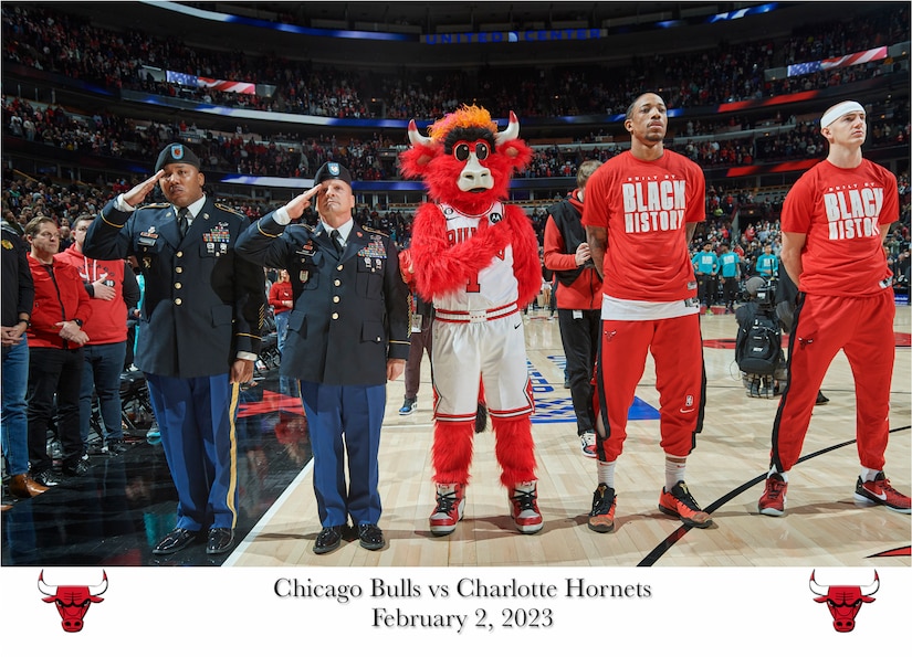 Chicago Bulls, National Basketball Association team, honors U.S. Army Reserve Sgt. 1st Class Cedrick Harding, left, and Sgt. Maj. Dennis Koski, of the 85th U.S. Army Reserve Support Command, during a home game versus the Charlotte Hornets at the United Center, February 2, 2023, in Chicago.