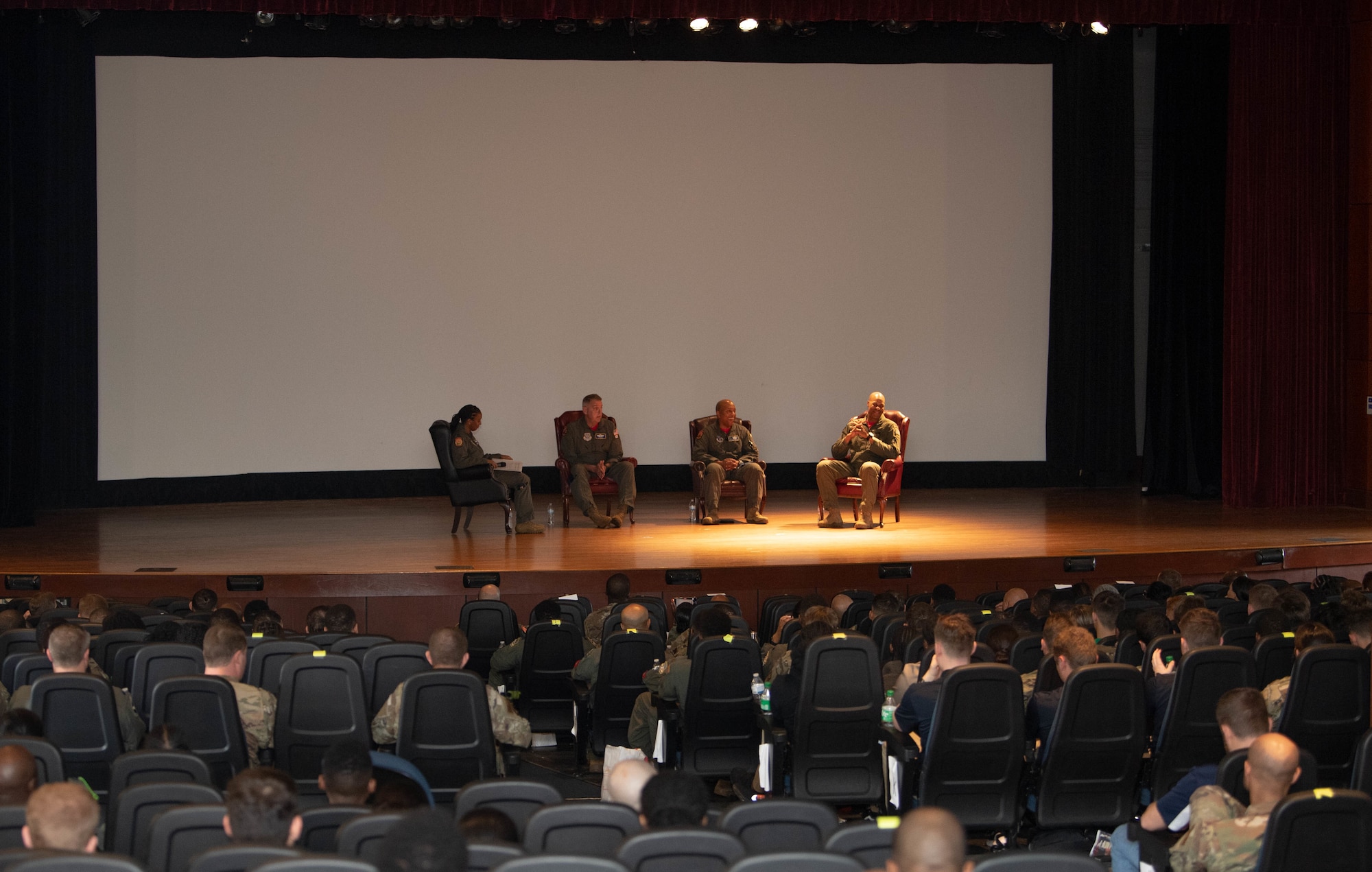 U.S. Air Force Capt. Jazmind Hill, KC-135 Stratotaker instructor pilot, moderates a mentorship panel with Gen. Mike Minihan, commander of Air Mobility Command, Brig. Gen. Konata Crumbly, Georgia Air National Guard director of the joint staff, and Col. Terrance Taylor, 27th Special Operations Wing commander, during Accelerating the Legacy 2023 at Joint Base Charleston, South Carolina, Feb. 17, 2023. Accelerating the Legacy is a platform from which minority Airmen can learn from experienced leaders and mentors, connect with other Airmen from different backgrounds and career fields, and gain valuable career insight. (U.S. Air Force photo by Staff Sgt. Dawn M. Weber)