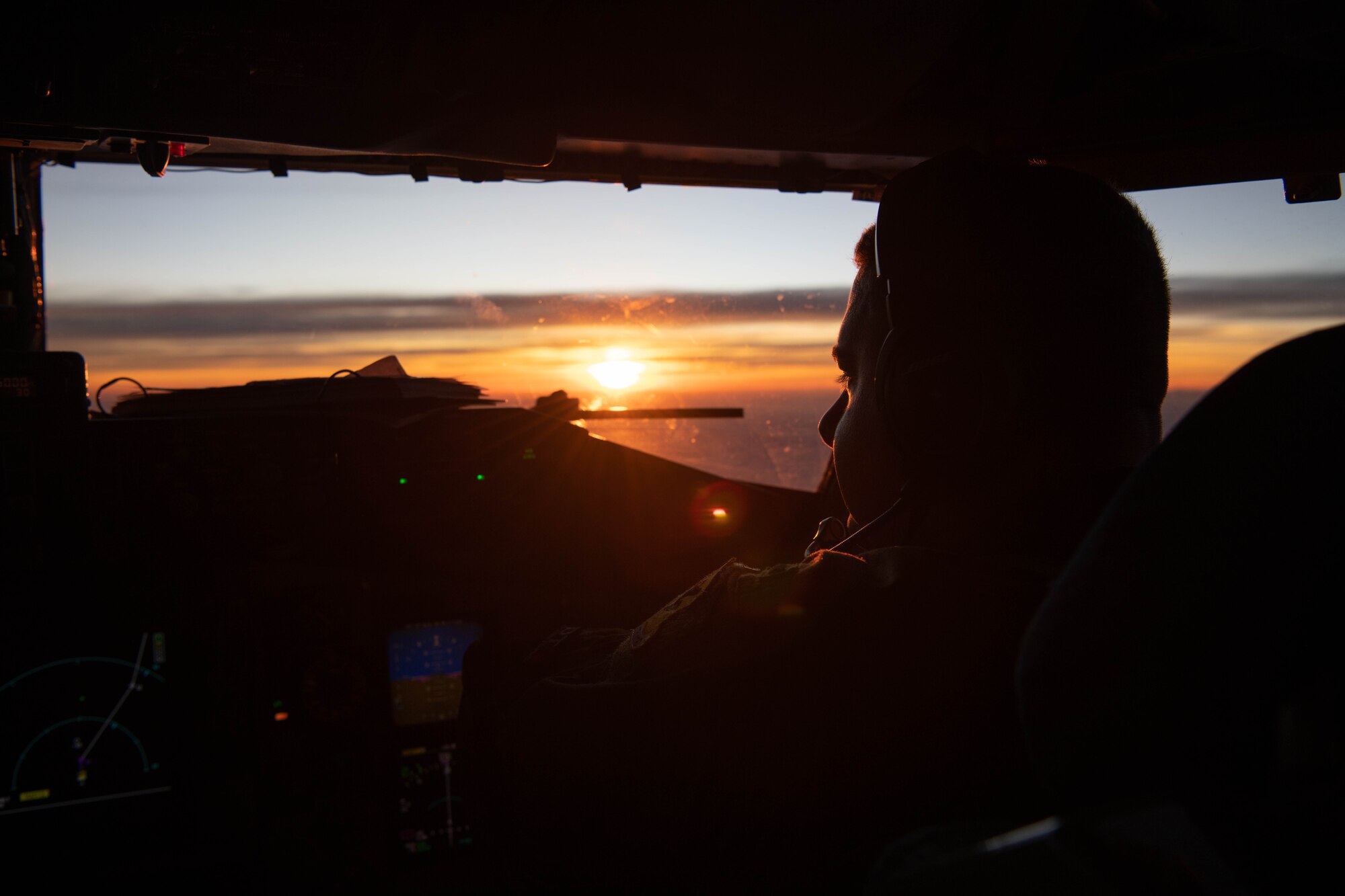 pilot flies plane