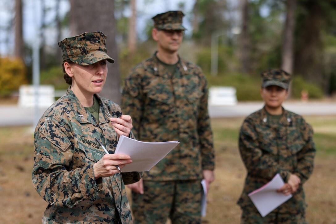 U.S. Marine Capt. Emma Thompson, Research and Assessments Officer, with II Marine Expeditionary Force conducts a training press conference with Communication Strategy and Operations Marines during Marine Expeditionary Force Exercise-23, Marine Corps Base Camp Lejeune, North Carolina, Feb. 16, 2023. MEFEX is an exercise that develops command and control capabilities and warfighting functions of the MEF staff as an operational command in preparation for crisis across the spectrum of conflict. In the scenario, MEF staff developed the ability to coordinate with non-governmental organizations, U. S. Agency for International Development, and other agencies in response to a foreign humanitarian crisis.