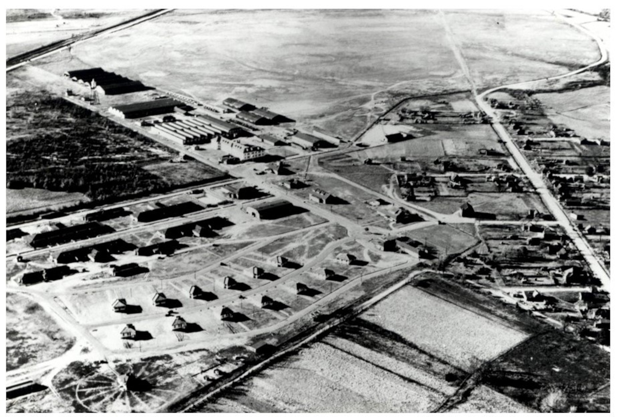 This ariel image taken circa 1928 shows Maxwell Field on the left and the African-American community of Douglassville on the right. As Maxwell’s mission continued to grow during the 1920s, which necessitated the need for more land, the government, through the imminent domain process, acquired the town of Douglassville. (U.S. Air Force archival image)