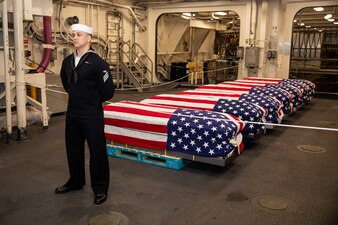 USS Arlington (LPD 24) prepares for a burial-at-sea.