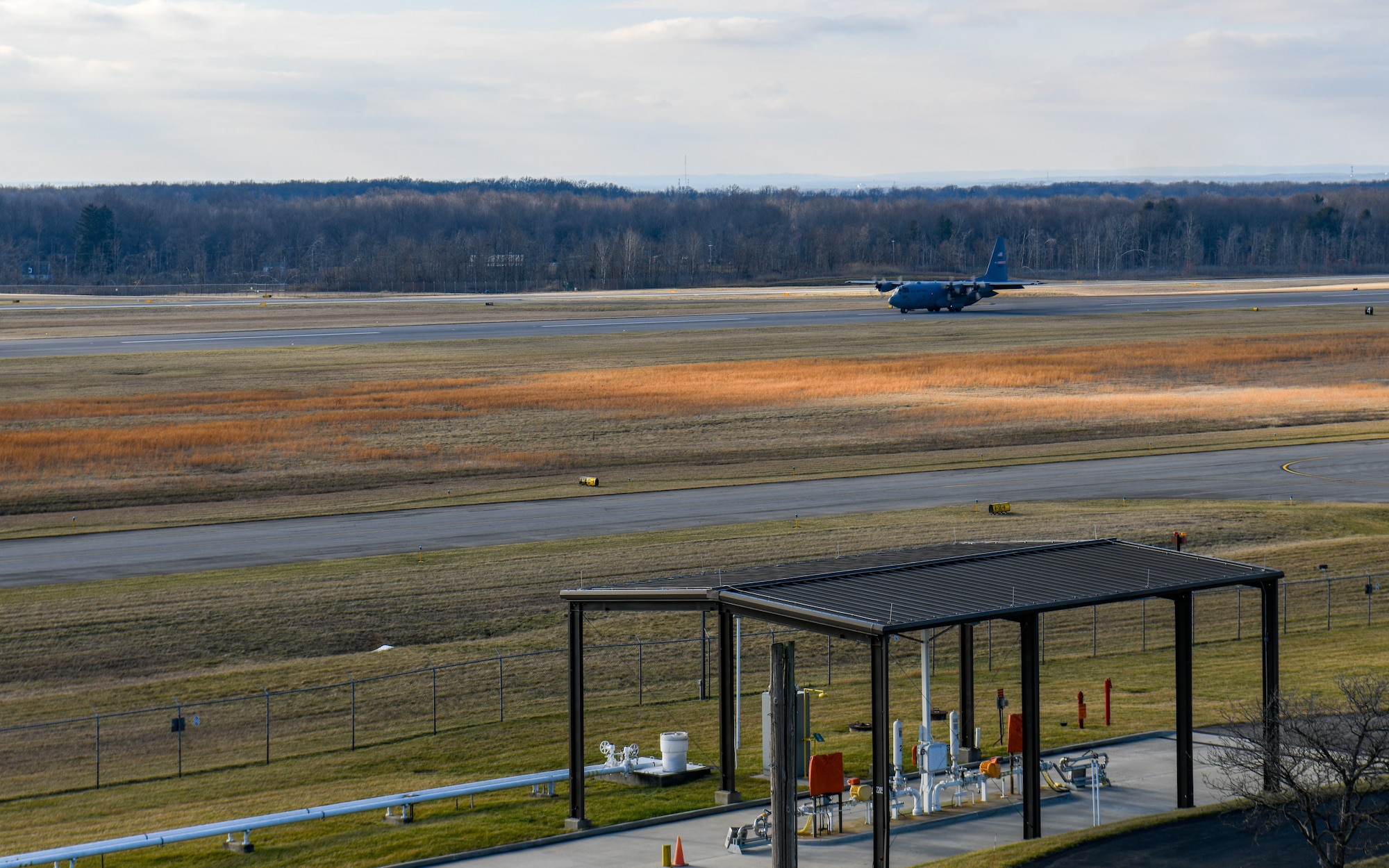 A C-130H Hercules assigned to the 757th Airlift Squadron lands at Youngstown Air Reserve Station, Ohio, Jan. 8, 2023, as seen from atop one of the installation’s fuel tanks.