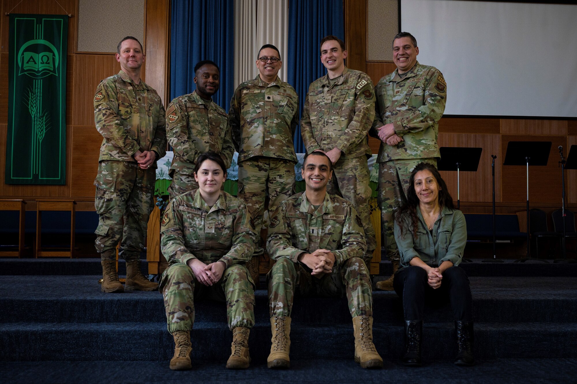 The 7th Bomb Wing Chapel Team poses for a photo in the chapel sanctuary at Dyess Air Force Base, Texas, Feb. 13, 2023. For the first time in nearly a decade, the 7th BW Chapel Team received the honor of being named the 2022 Air Force Global Strike Command Medium Chapel Team of the Year. (U.S. Air Force photo by Senior Airman Colin Hollowell)