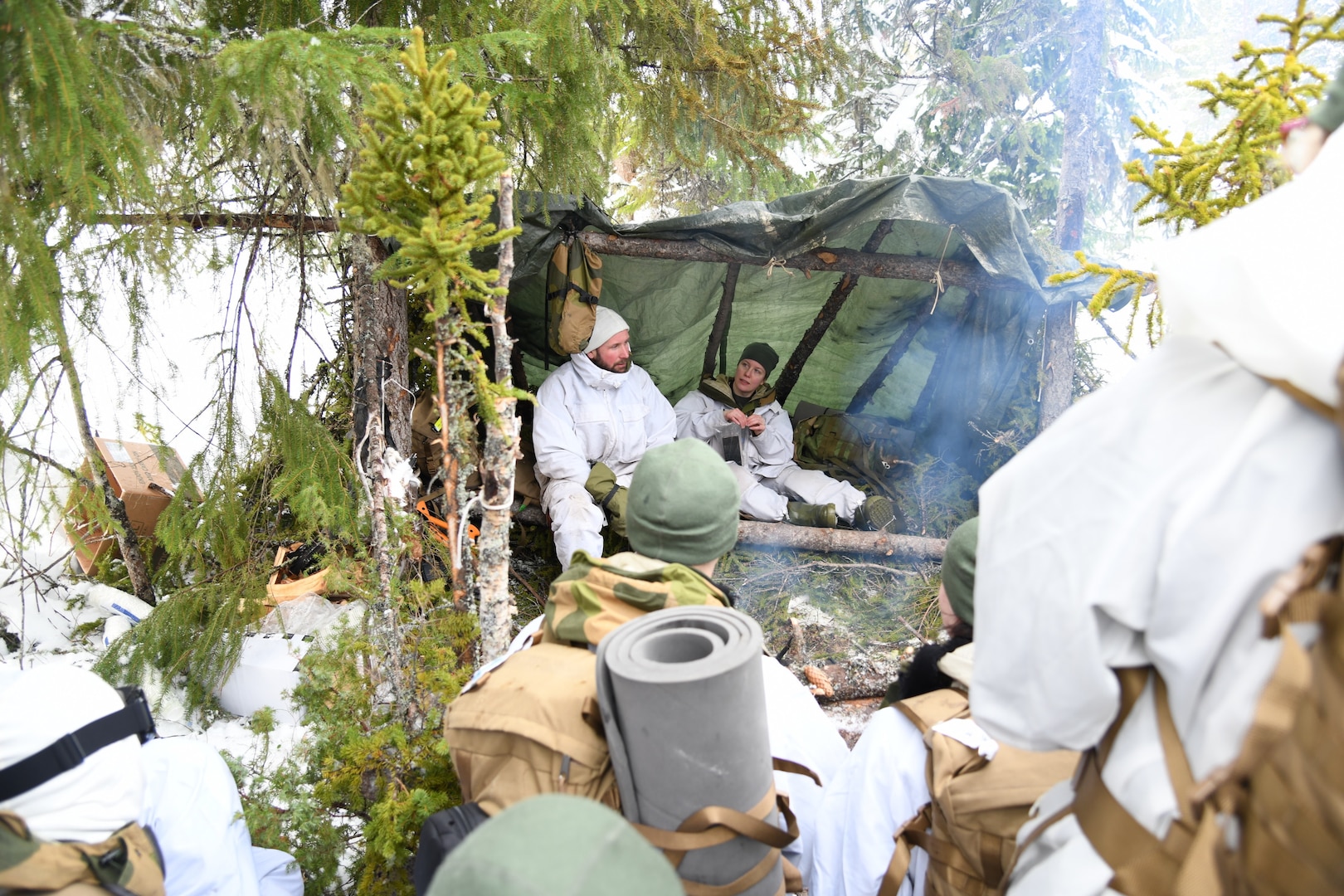 Minnesota National Guard members conduct winter training on Feb. 6, 2023, as part of a five-day field training exercise at Base Camp 1 in the Haltdalen woods, Norway, while participating in the 50th Norwegian Reciprocal Troop Exchange. NOREX began in 1973 and is the longest-running military troop exchange between two nations.